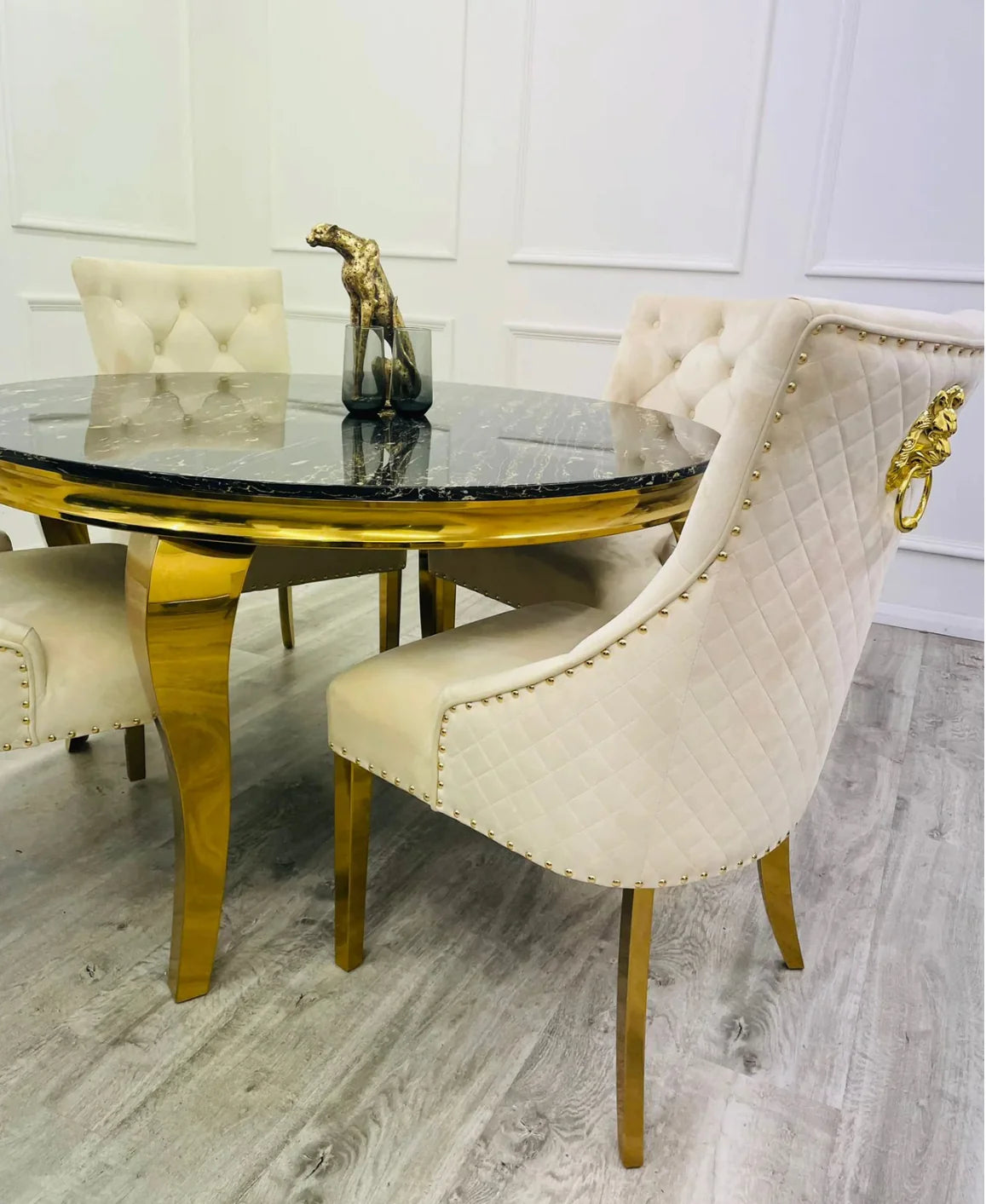 Louis 130cm Round Cream & Gold Marble Dining Table + Majestic Cream Gold Lion Knocker Dining Chairs