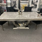 Ariel Marble Dining Table Black With Majestic Light Grey Lion Knocker Chairs